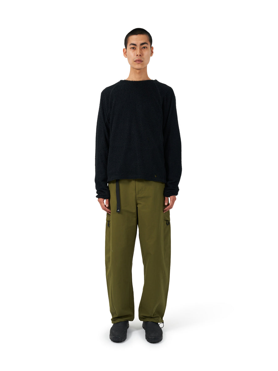 Model wearing the black PMO Polartec Alpha Direct 90 Pullover