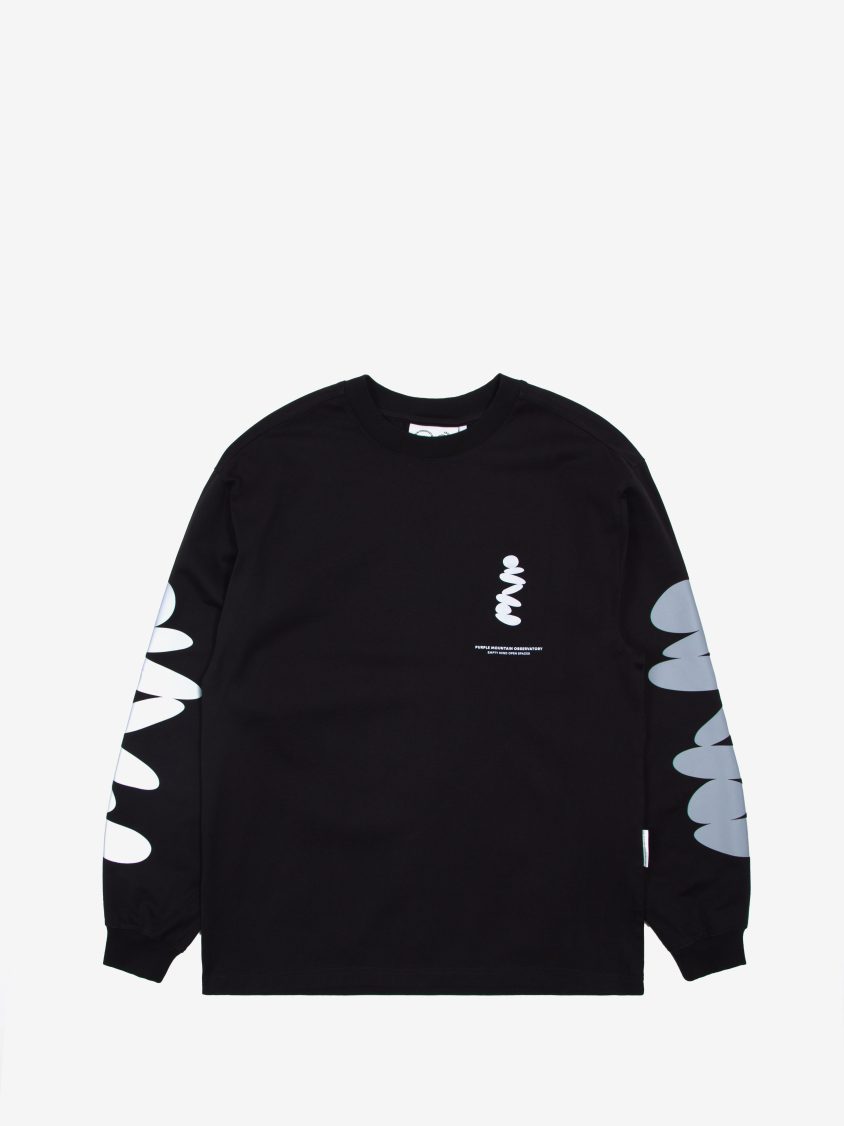 Model wearing Boulders LS Tee Black with graphic print on chest. premium heavyweight cotton