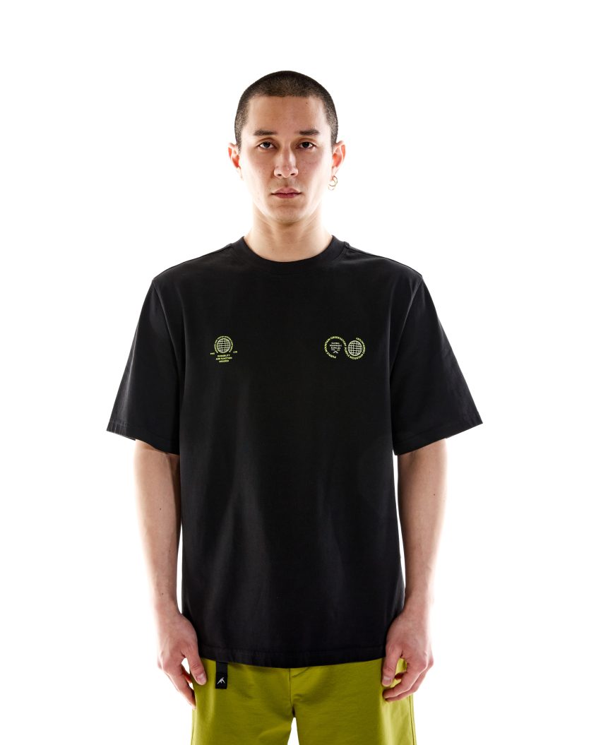 Model wearing White Cotton T-shirt . Globe SS Tee Black