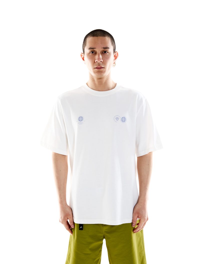 Model wearing White Cotton T-shirt . Globe SS Tee White