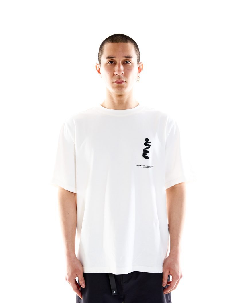 Model wearing Boulders SS Tee – White with graphic print on chest. premium heavyweight cotton